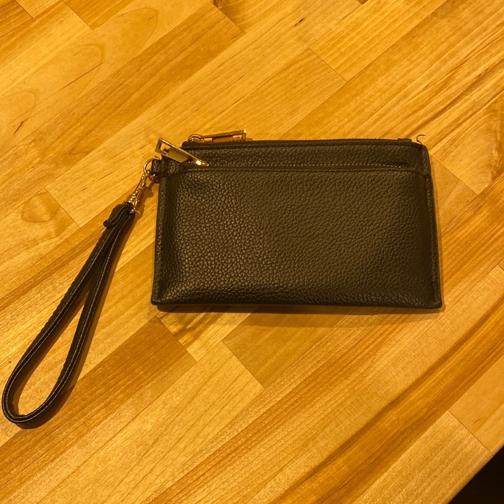 Target a new day black and gold wristlet